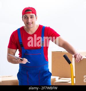The contractor worker moving boxes during office move Stock Photo