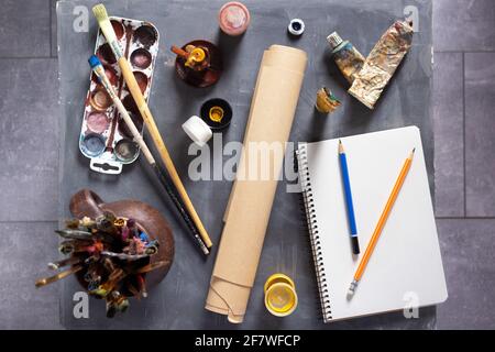 Paintbrush and tubes with painter tools at abstract table background texture. Art painter concept and paint brush Stock Photo
