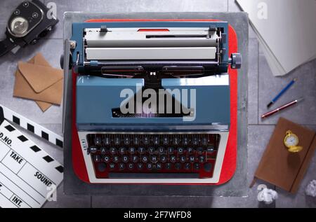 Vintage typewriter at table and relax creative concept design. Movie and screenwriter or writer concept Stock Photo