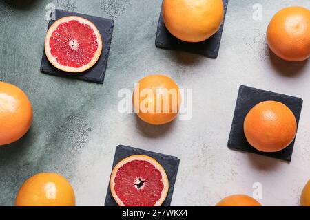 Ripe grapefruits on light background Stock Photo