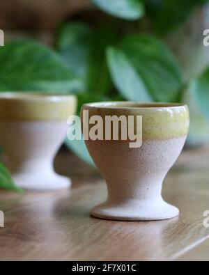 Pottery egg cups made using a manual 'Kickwheel' pottery wheel Stock Photo
