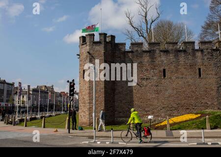 Cardiff, Wales, UK. 10th Apr, 2021. A Wales flag at Cardiff Castle flies at half mast ahead of a gun to mark the death of Prince Philip. Credit: Mark Hawkins/Alamy Live News Stock Photo