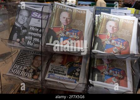 Glasgow, UK, 10th April 2021. A display of newspapers announcing the death of His Royal Highness Prince Philip, Duke of Edinburgh, at the age of 99-years. Photo credit: Jeremy Sutton-Hibbert/Alamy Live News Stock Photo