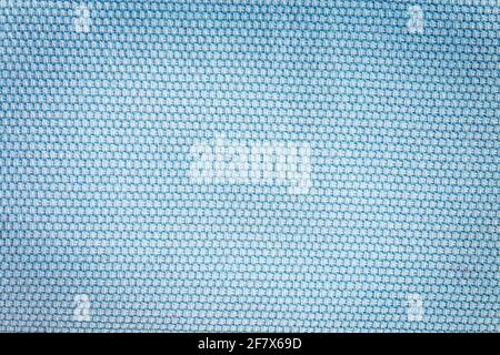 Rustic canvas fabric texture in light blue woven color. Stock Photo