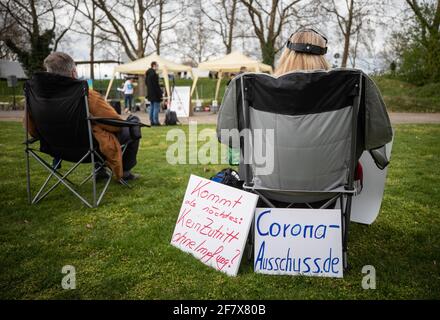 10 April 2021, Baden-Wuerttemberg, Heilbronn: ''Coming next: No entry without vaccination?'' and ''Corona-Ausschuss.de'' is written on the sign of a participant of a demonstration of the initiative 'Querdenken'. The demonstration is directed against the pandemic restrictions of the federal government. Photo: Christoph Schmidt/dpa Stock Photo