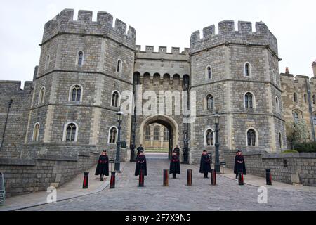 10 April 2021 - Windsor UK: Staff in mourning outside the main entrance to Windsor Castle following the death of HRH Prince Philip. High quality photo Stock Photo