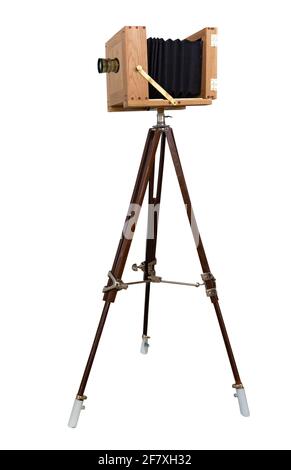 old camera on a tripod Isolated on white background Stock Photo