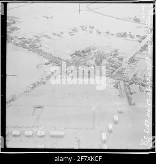 Watersnoodramp 1953. Air photo of Nieuwe-Tonge with an overview of the area affected by the disaster. In the middle the reformed church at the Kerkring. Stock Photo