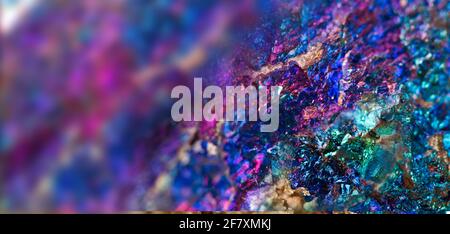 Copper pyrite. Mineral chalcopyrite. Texture minerals. Beautiful natural color purple background. Macro. Extreme closeup beautiful jewel background. S Stock Photo