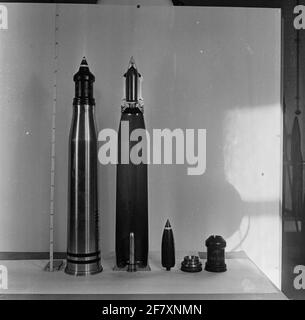 A complete 76.2 mm grenade (explosive and pushing load) with a cross ...