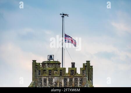 Union Jack flag flying at half-mast honouring Prince Philip, Duke of Edinburgh after his death Stock Photo