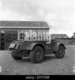 A staghound armored wagon. This reconnaissance vehicle, equipped with a 37 mm cannon into a rotating dome, was one of the first armored cars that entered the army after 1945. Stock Photo