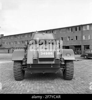 A staghound armored wagon. This reconnaissance vehicle, equipped with a 37 mm cannon into a rotating dome, was one of the first armored cars that entered the army after 1945. Stock Photo