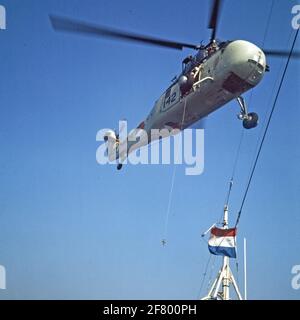 The Sikorsky HSS-1N (SH-34J, UH-34J) submarine control helicopter 142 (1960-1972) with lowered hoist. Stock Photo