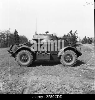 A staghound armored wagon. This reconnaissance vehicle, equipped with a 37 mm cannon into a rotating dome, was one of the first armored cars that entered the army after 1945. Stock Photo