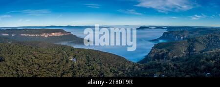 Aerial view of fog in Megalong Valley near Blackheath in The Blue Mountains in regional New South Wales in Australia Stock Photo