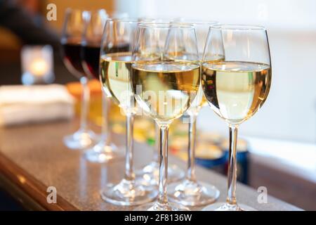 choice of white or red wine at a party served on a table Stock Photo