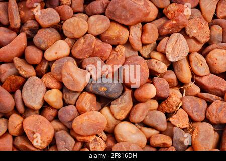 decorative rustic pink pebble stones in close up Stock Photo