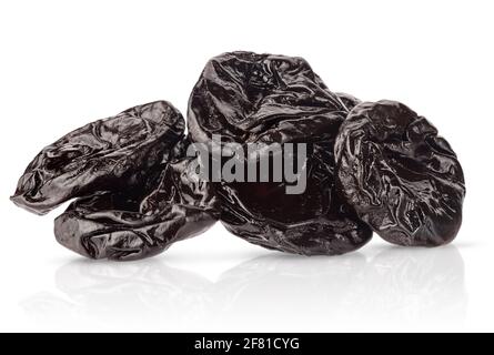 Heap of smoked or dried plums isolated with clipping path on white background. Stock Photo