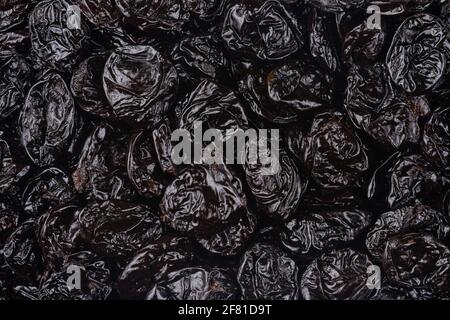 Pattern of dried prunes. Top view, overhead. Stock Photo