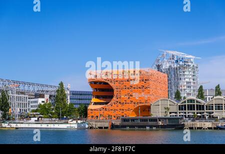 Lyon, France - August 22, 2019: The Orange Cube building at Confluence harbor in Lyon, France Stock Photo