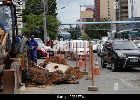 salvador, bahia / brazil - january 24, 2019: workers work to repair water pipes at Embasa in the Pituba neighborhood in the city of Salvador.    *** L Stock Photo