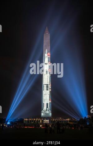 The Apollo 11 Saturn V rocket projected onto the Washington Monument to celebrate the 50th Anniversary of the Moon landing in 1969. Stock Photo