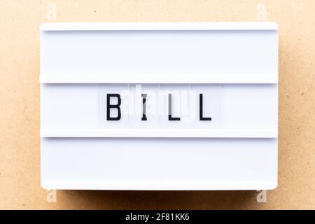 Lightbox with word bill on wood background Stock Photo