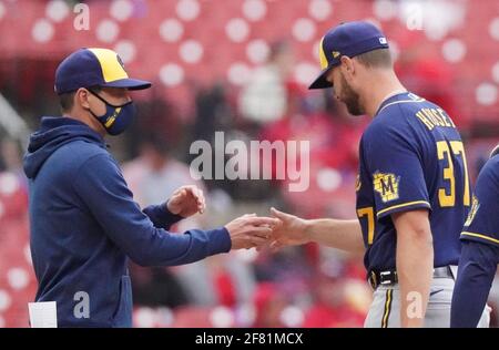 St. Louis, United States. 10th Apr, 2021. Milwaukee Brewers manager Craig Counsell takes the baseball from starting pitcher Adrian Houser in the sixth inning against the St. Louis Cardinals at Busch Stadium in St. Louis on Saturday, April 10. 2021. Photo by Bill Greenblatt/UPI Credit: UPI/Alamy Live News Stock Photo