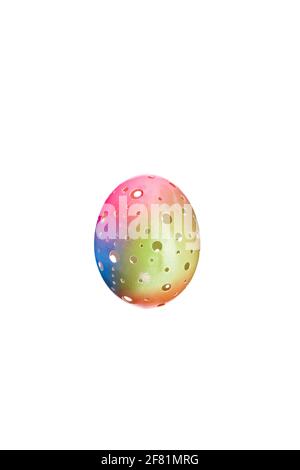 Rainbow color manually carved egg shell for special Easter holiday isolated against white background. Unique handraft gift for a special person Stock Photo