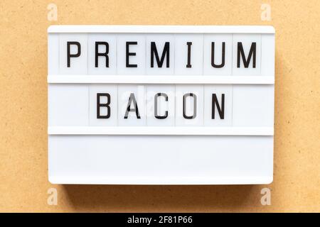 Lightbox with word premium bacon on wood background Stock Photo