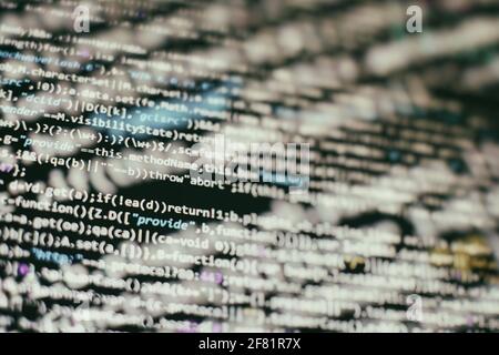 Website HTML Code on the Laptop Display Closeup Photo. Information technology website coding standards for web design Programmer developer screen. Stock Photo