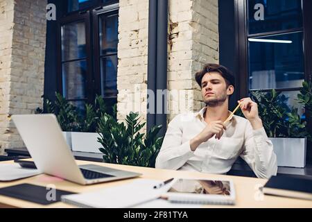 businessman working on laptop in office Stock Photo