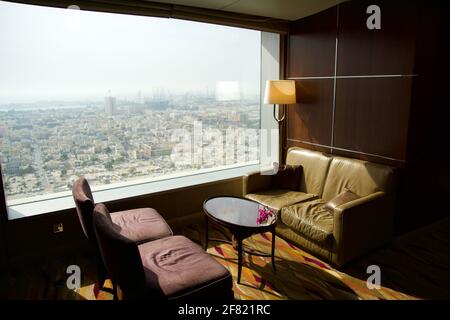 DUBAI, UNITED ARAB EMIRATES - JUN 16, 2019: Empty chairs in a business hotel lounge in an upper floor Stock Photo