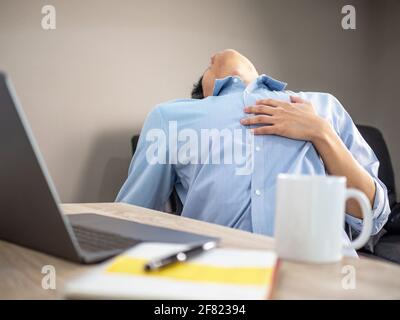 Heart Attack on work or study Stock Photo