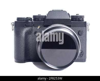 Mirrorless digital camera isolated on white background. Stock Photo