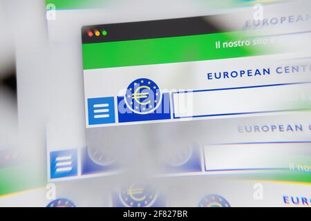 Milan, Italy - APRIL 10, 2021: European Central Bank logo on laptop screen seen through an optical prism. Dynamic and unique image from European Centr Stock Photo