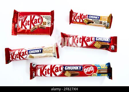 Selection of Nestle Kit Kat Chocolate Bars on a white background Stock Photo