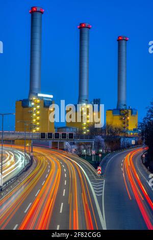 Power station and highway at night seen in Berlin, Germany Stock Photo