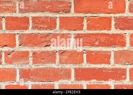 Background with old red stone brick wall Stock Photo