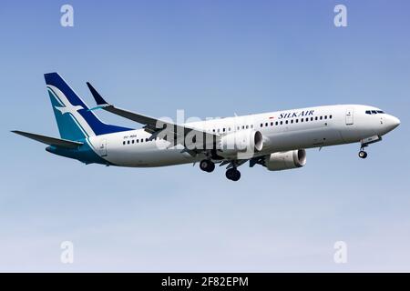 Changi, Singapore – January 29, 2018: Silkair Boeing 737 MAX 8 airplane at Changi airport (SIN) in Singapore. Boeing is an American aircraft manufactu Stock Photo