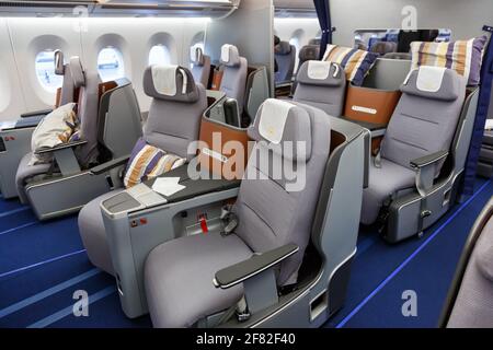 Munich, Germany – February 9, 2017: Lufthansa Business Class seats in an Airbus A350 airplane at Munich airport (MUC) in Germany.