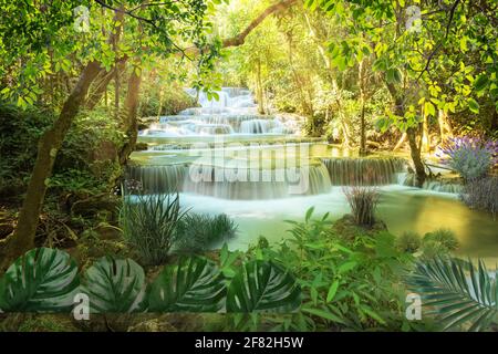 Huay Mae Khamin waterfall in Kanchanaburi, Thailand South east asia Jungle landscape with amazing turquoise water of cascade waterfall at deep tropica Stock Photo