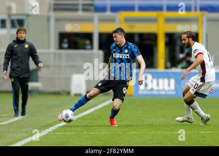 Giuseppe Meazza stadium, Milan, Italy, 11 Apr 2021, Alessandro Bastoni (FC Internazionale) saving the ball from going out of the pitch line during Inter - FC Internazionale vs Cagliari Calcio, Italian football Serie A match - Photo Francesco Scaccianoce / LM Stock Photo
