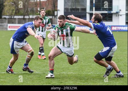 Sale, England - 11th April 2021 - Danny Walker (16) of Warrington Wolves skips through to score try during the Rugby League Betfred Challenge Cup Round 3 Swinton Lions vs Warrington Wolves at Heywood Road Stadium, Sale, UK  Dean Williams/Alamy Live News Stock Photo