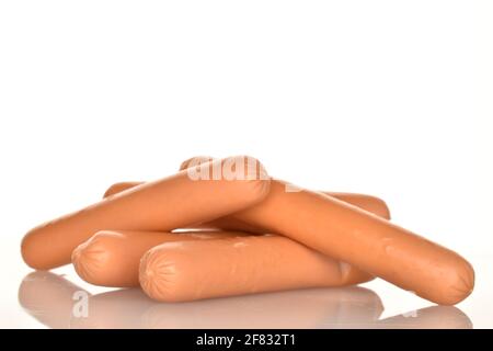 Several fresh fragrant, tasty, sausages on a white background. Stock Photo