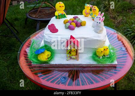Easter cake with rabbit and chick decorations Stock Photo