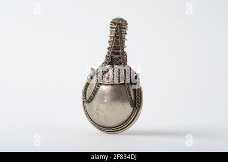 A small, antique snuff container collected in Bhutan, but of Tibetan  origin. Approximately 4 in height Stock Photo - Alamy