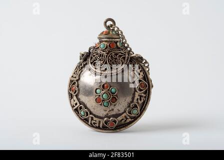 A small, antique snuff container collected in Bhutan, but of Tibetan  origin. Approximately 4 in height. Includes white yak horn as container  body Stock Photo - Alamy