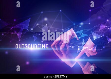 Businessman touching huge screen concept Stock Photo